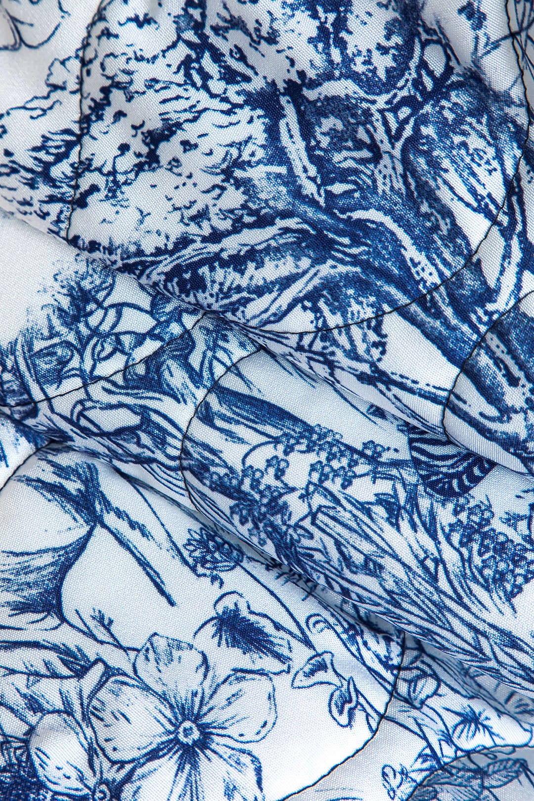 Flora | Geblümte Steppjacke met blauwe print – Stijlvol en gezellig