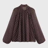 Elegante damesblouse met stippen en strik, lange mouwen
