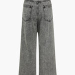 Lara | Broeken met wijde pijpen en asymmetrische details