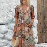 Zomerkleed met V-hals & Allover-patroon – Kniehoog & comfortabel