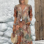 Zomerkleed met V-hals & Allover-patroon – Kniehoog & comfortabel