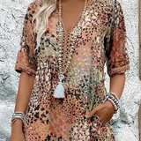 Zomerkleed met V-hals & Allover-patroon – Kniehoog & comfortabel