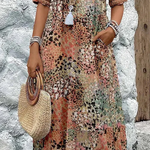 Zomerkleed met V-hals & Allover-patroon – Kniehoog & comfortabel
