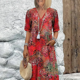 Zomerkleed met V-hals & Allover-patroon – Kniehoog & comfortabel