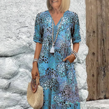 Zomerkleed met V-hals & Allover-patroon – Kniehoog & comfortabel