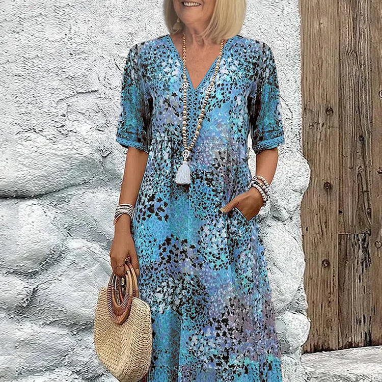 Zomerkleed met V-hals & Allover-patroon – Kniehoog & comfortabel