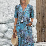 Zomerkleed met V-hals & Allover-patroon – Kniehoog & comfortabel