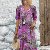 Zomerkleed met V-hals & Allover-patroon – Kniehoog & comfortabel