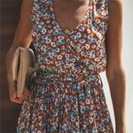 Mouwloze Maxijurk met Bloemenprint & Split – Zomerse & Elegante