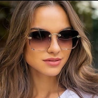 Luxe Zonnebril met Gradient Glazen en Elegant Frame