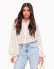 Elegante transparante blouse met bloemenpatroon – Crème