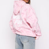 Vol. 1 Oversized Geprinte Hoodie Posy Bow – Comfortabel, Speels en Stijlvol